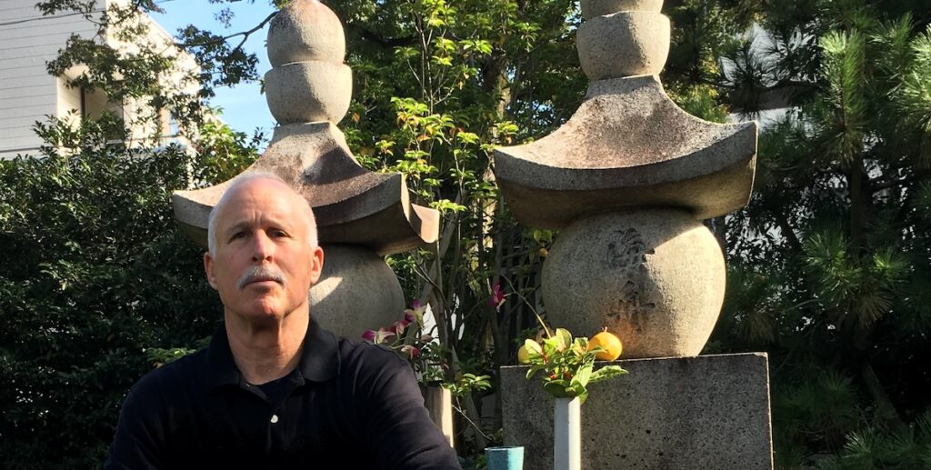 Romulus Hillsborough at the grave of Katsu Kaishū in Tokyo
